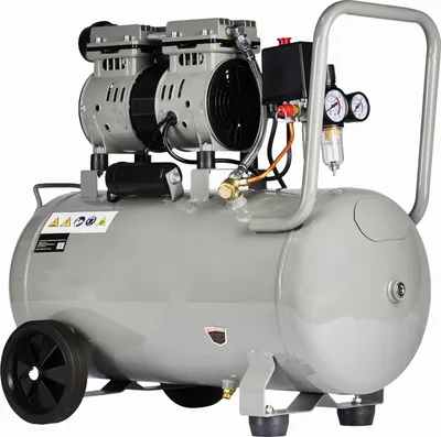 A gray air compressor with two motors on top, a tank, wheels, and a handle.
