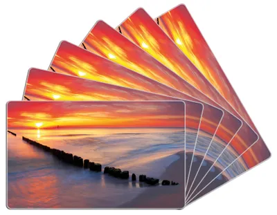 Produktbild von Wallario Frühstücksbrettchen 6er Set aus Glas, je 14 x 23 cm, mit rutschfesten Füßen, Motiv Farbenspiel im Himmel - Sonnenuntergang am Strand