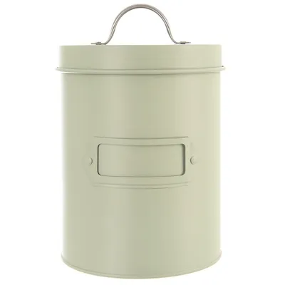 A light green metal storage container with a handle and a label holder on the front.
