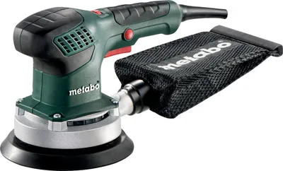 A studio shot of a Metabo orbital sander with a dust bag attached.