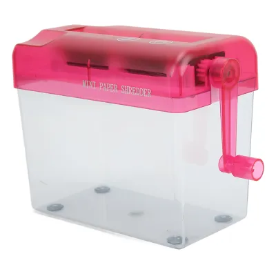 A pink and clear manual paper shredder with a crank.