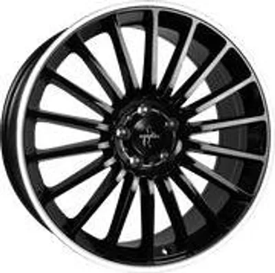 A black and silver alloy wheel with a polished lip.