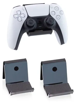A white game controller is mounted on a black stand, with two black stands below it.