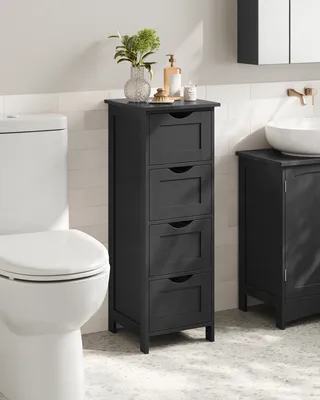 A black bathroom cabinet with four drawers is shown next to a toilet in a bathroom setting.