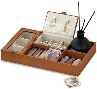 Zdjęcie produktu dla Organizer na biżuterię Unyqoos® – eleganckie, kompaktowe pudełko na biżuterię z kremowym, aksamitnym wykończeniem, wielofunkcyjne przegródki do przechowywania kolczyków, naszyjników, bransoletek i kosmetyków