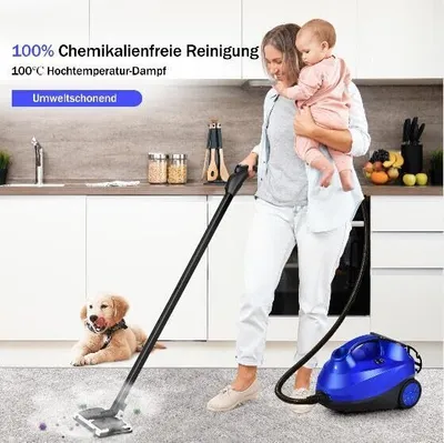 A woman is cleaning a floor with a steam cleaner while holding a baby. A dog is lying on the floor nearby.
