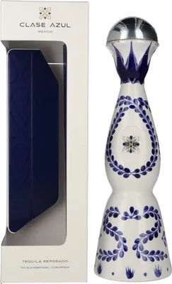 A bottle of Clase Azul Reposado Tequila and its packaging are displayed against a white background.