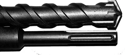 Close-up view of the tip and shank of two drill bits.