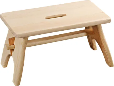 A light-colored wooden step stool with a handle cutout on the top surface, shown against a white background.
