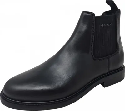 A black leather Chelsea boot is shown against a white background.
