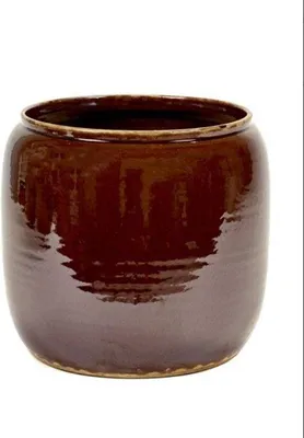 A brown ceramic pot on a white background.
