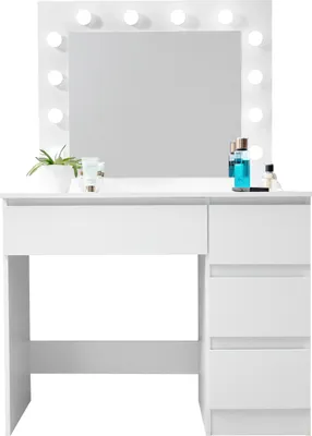 A white vanity table with a mirror and lights, and some cosmetic products on top.