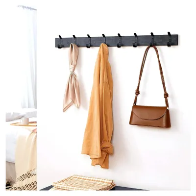 Produktbild von Wandgarderobe mit 8 Haken für Jacken im Industrial Design aus schwarz lasiertem Holz und Metall, Maße 86 x 6,5 x 1,5 cm