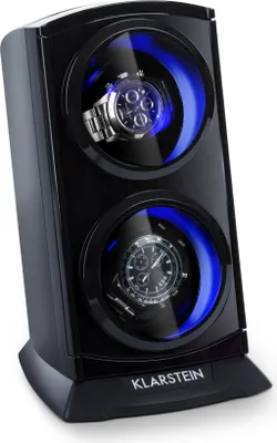 A black watch winder with two compartments, each holding a watch. Blue LED lights illuminate the compartments.