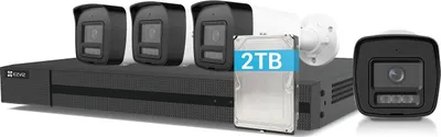 A security camera system kit including an NVR, multiple cameras, and a hard drive.