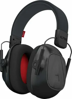 A pair of black noise-canceling headphones with red inner ear cups.