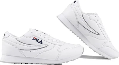Two white Fila sneakers are shown against a white background.