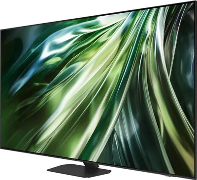 A black television set with a colorful abstract image displayed on its screen, placed on a black stand.