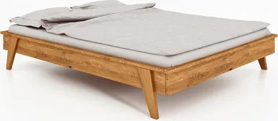 Produktbild von Bett Jetro 3 Sonderlänge 180x210 Wildeiche massiv ohne Kopfteil mit Holzbeinen