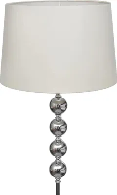 A floor lamp with a white shade and a silver base made of stacked spheres.