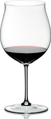 A clear studio shot of a wine glass filled with red wine.