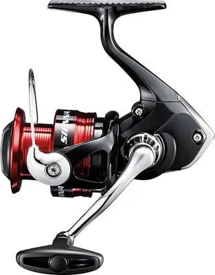 A studio shot of a fishing reel against a white background.