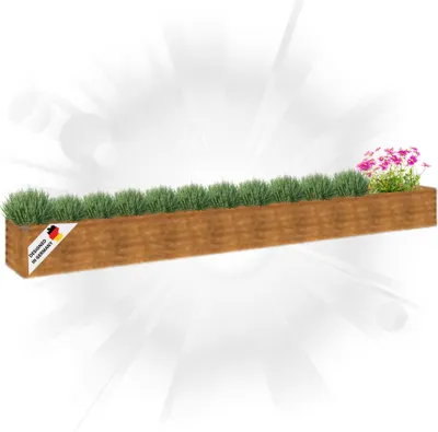 A wooden planter box filled with green plants and a few pink flowers, with a "Designed in Germany" label on the side.