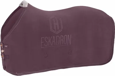 A purple horse blanket with the Eskadron logo embossed on it.