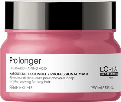 A pink jar of L'Oréal hair mask with a black lid, set against a white background.