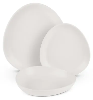 A set of three white, irregularly shaped plates stacked on a white background.