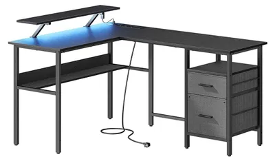 Immagine prodotto di Scrivania angolare a forma di L con prese di corrente, colore nero, dimensioni 120 x 140 x 75 cm