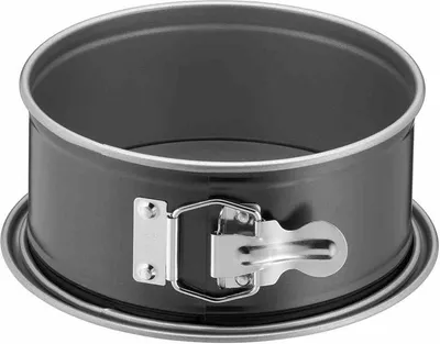 A round springform pan with a removable side and a clamp mechanism.
