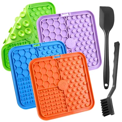 Imagen del producto de 4 alfombrillas absorbentes para perros y gatos, de 15,5 x 17 cm, con ventosas
