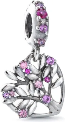 A close-up studio shot of a silver charm with pink and purple stones.