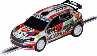 A toy rally car on a track.