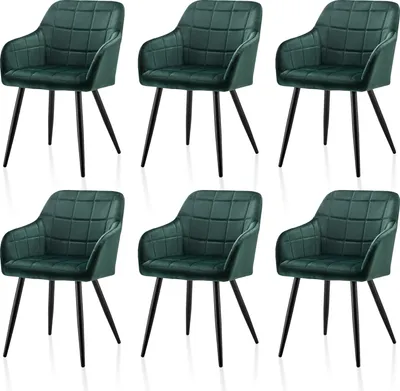 Six green velvet dining chairs are arranged in two rows of three against a white background.