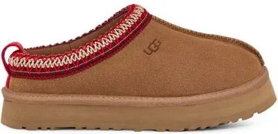 A single brown UGG slipper with a decorative trim.