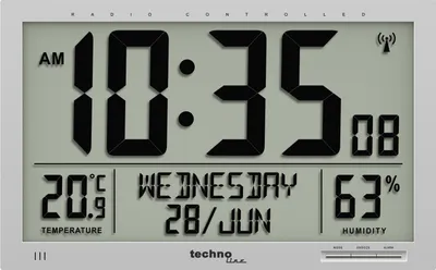 A digital clock displaying time, date, temperature, and humidity.