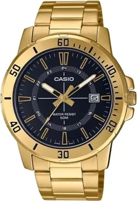 A close-up studio shot of a gold Casio watch with a black dial.
