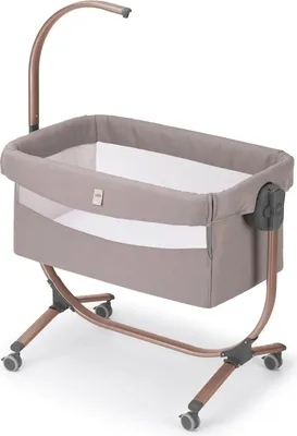 A baby crib with a mobile arm attached, shown on a white background.