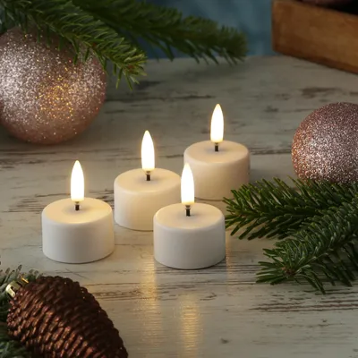 Produktbild von LED Mini Teelichter - 4 wiederaufladbare LED Teelichter - D: 4cm - Timer - weiß - für Außen