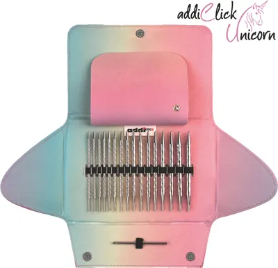 A knitting needle set laid out in its case, with the case open to reveal the needles.