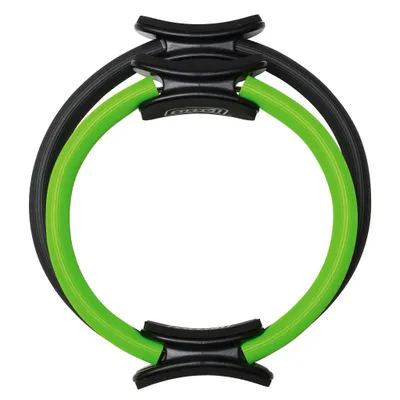 A green and black Pilates ring is shown against a white background.