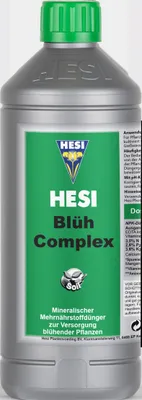 A bottle of plant fertilizer on a light gray background.