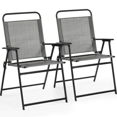Two gray folding chairs with black frames are shown against a white background.
