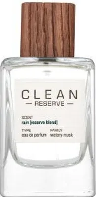 A clear, front-facing studio shot of a perfume bottle with a wooden cap.