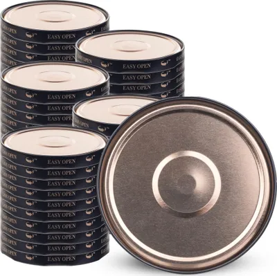 Zdjęcie produktu dla KADAX Nakrętka fi66 mm, zestaw zamiennych nakrętek metalowych, nakrętki do weków 50 sztuk (czarno-złota orbita)