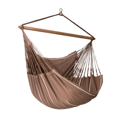 A hanging chair suspended from a wooden spreader bar and a metal hook.