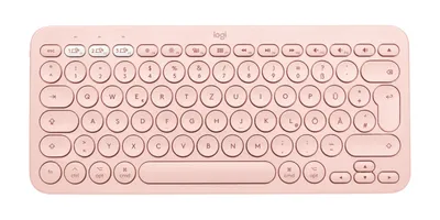 A pink Logitech K380 keyboard for Mac is shown from a top-down perspective on a white background.