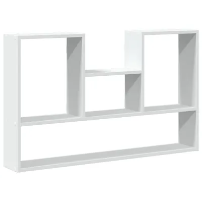 A white, multi-compartment wall shelf unit against a white background.